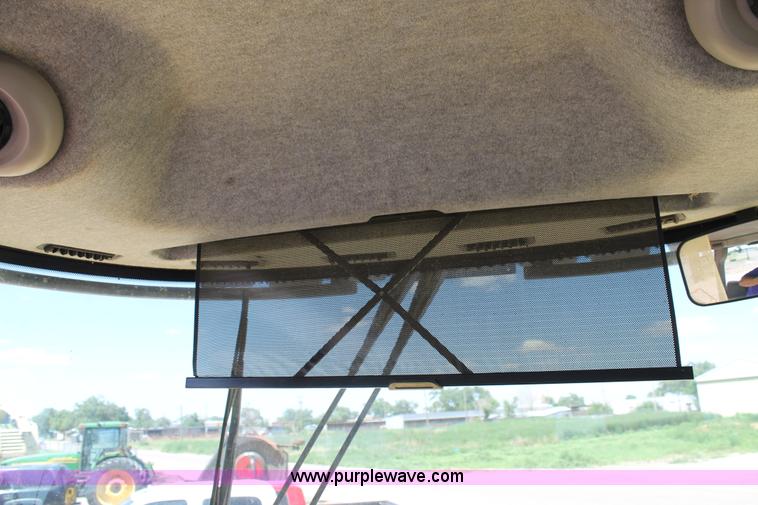 image for item C3892 2006 New Holland HW365 self-propelled windrower