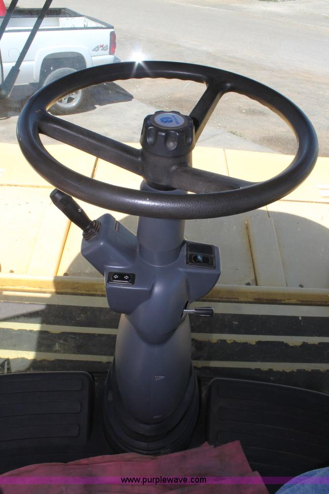 image for item C3892 2006 New Holland HW365 self-propelled windrower