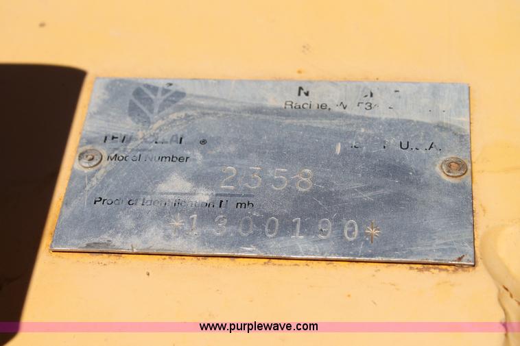 image for item C3892 2006 New Holland HW365 self-propelled windrower