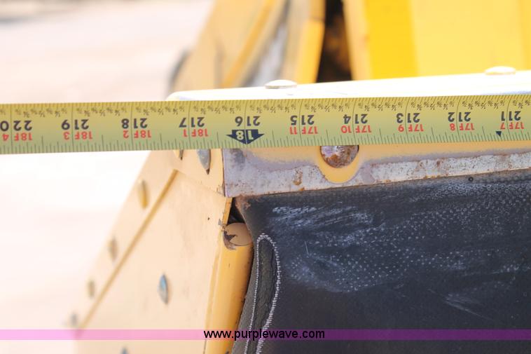 image for item C3892 2006 New Holland HW365 self-propelled windrower