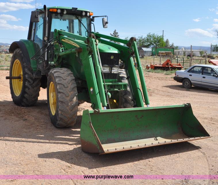 image for item F2024 2003 John Deere 7520 MFWD tractor