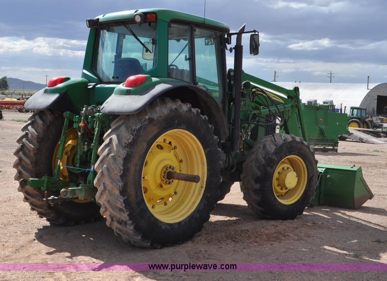 image for item F2024 2003 John Deere 7520 MFWD tractor