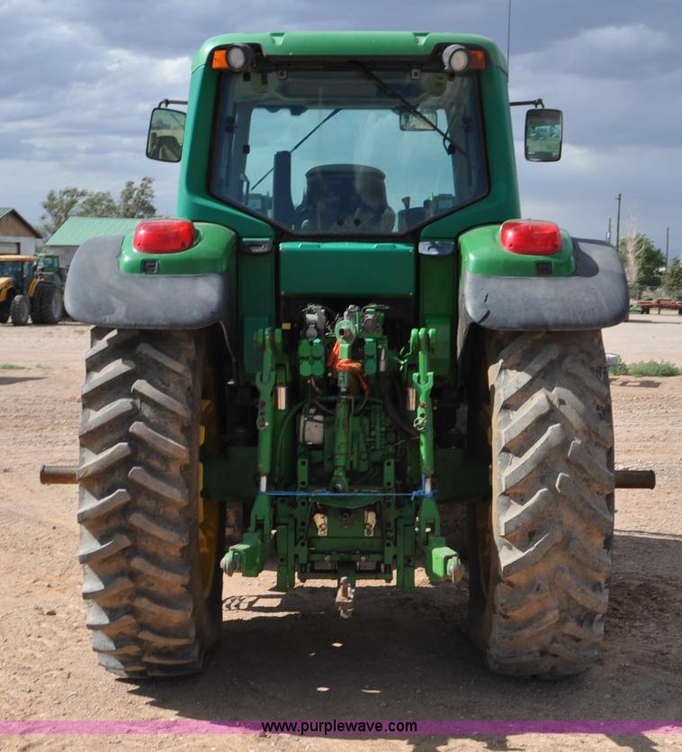 image for item F2024 2003 John Deere 7520 MFWD tractor