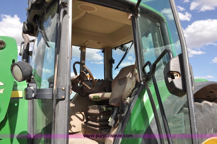 image for item F2024 2003 John Deere 7520 MFWD tractor