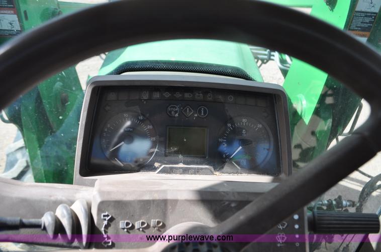 image for item F2024 2003 John Deere 7520 MFWD tractor