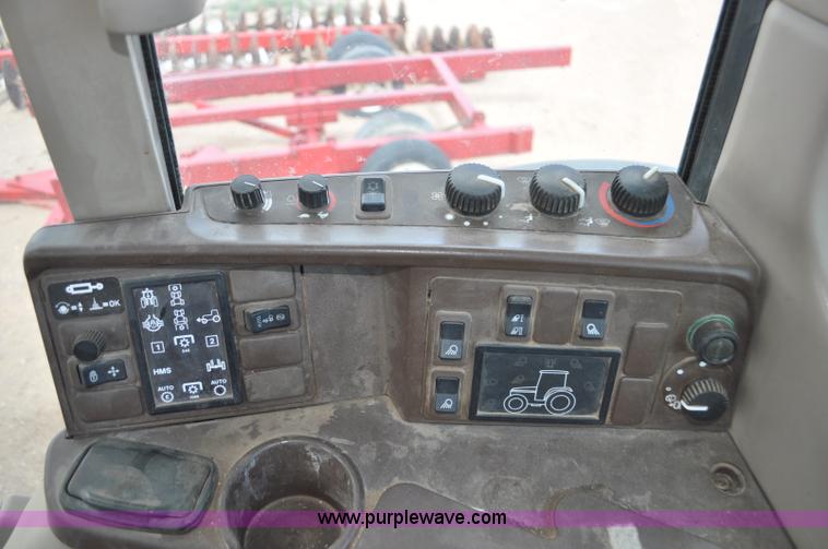 image for item F2024 2003 John Deere 7520 MFWD tractor