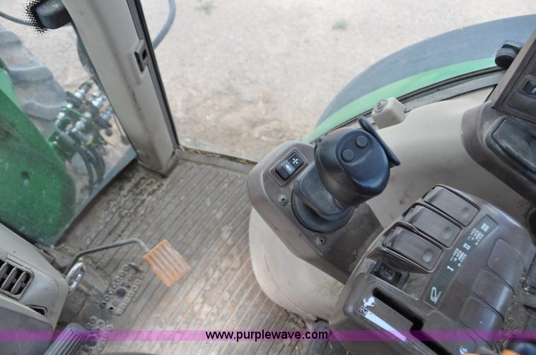 image for item F2024 2003 John Deere 7520 MFWD tractor