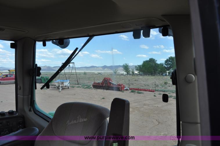 image for item F2024 2003 John Deere 7520 MFWD tractor