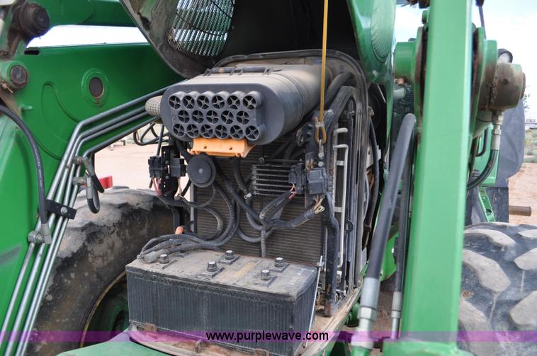 image for item F2024 2003 John Deere 7520 MFWD tractor