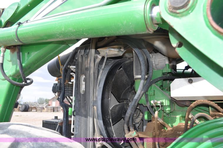 image for item F2024 2003 John Deere 7520 MFWD tractor