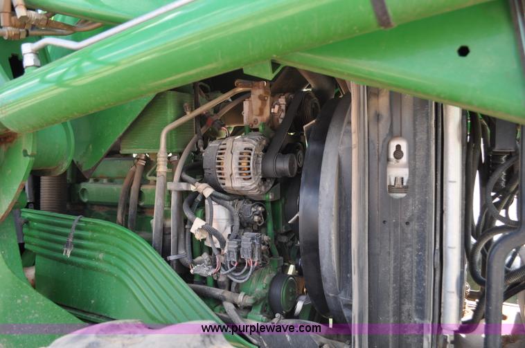 image for item F2024 2003 John Deere 7520 MFWD tractor