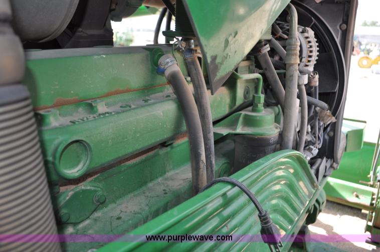 image for item F2024 2003 John Deere 7520 MFWD tractor