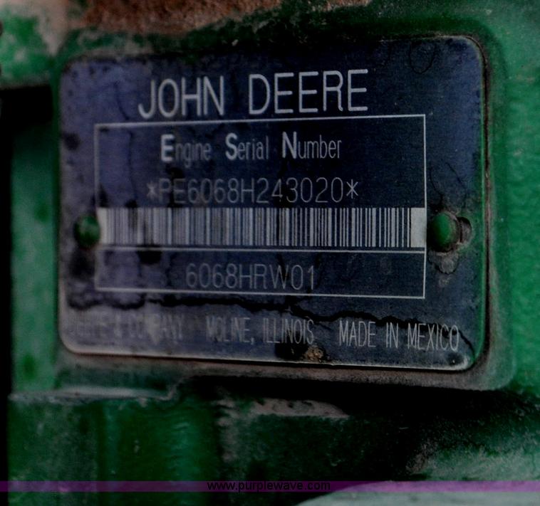 image for item F2024 2003 John Deere 7520 MFWD tractor