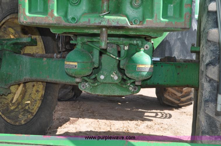 image for item F2024 2003 John Deere 7520 MFWD tractor