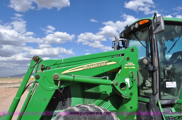image for item F2024 2003 John Deere 7520 MFWD tractor