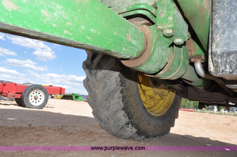 image for item F2024 2003 John Deere 7520 MFWD tractor