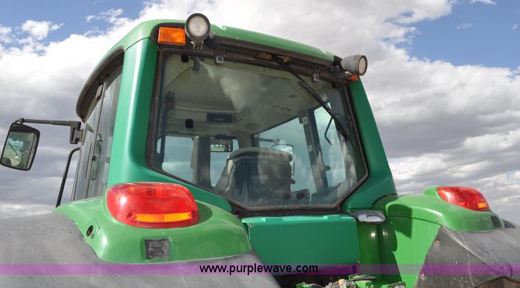 image for item F2024 2003 John Deere 7520 MFWD tractor