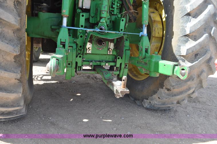 image for item F2024 2003 John Deere 7520 MFWD tractor