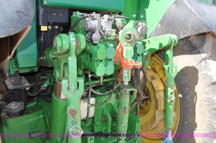 image for item F2024 2003 John Deere 7520 MFWD tractor