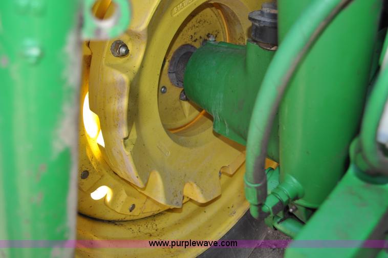 image for item F2024 2003 John Deere 7520 MFWD tractor