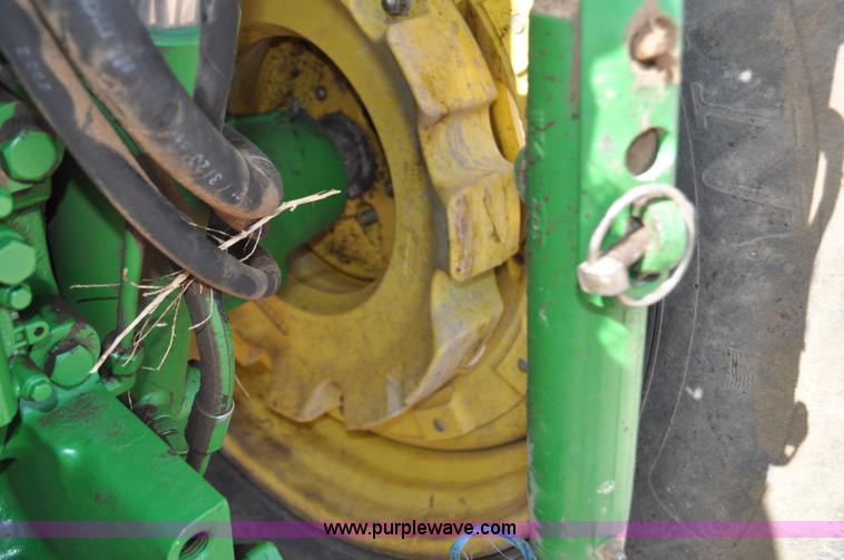 image for item F2024 2003 John Deere 7520 MFWD tractor