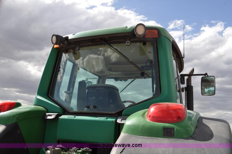 image for item F2024 2003 John Deere 7520 MFWD tractor