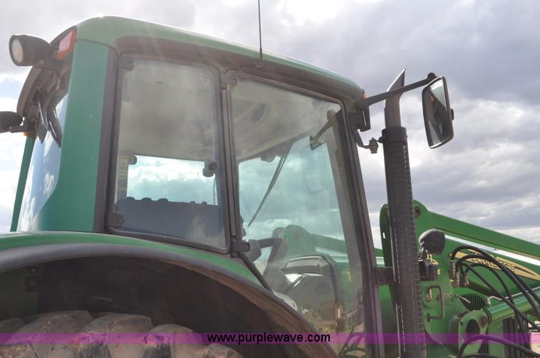 image for item F2024 2003 John Deere 7520 MFWD tractor
