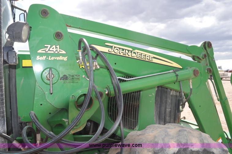 image for item F2024 2003 John Deere 7520 MFWD tractor