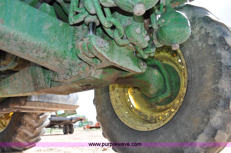 image for item F2024 2003 John Deere 7520 MFWD tractor