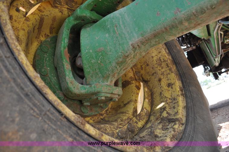 image for item F2024 2003 John Deere 7520 MFWD tractor