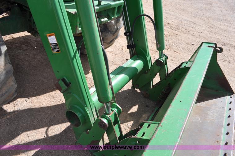 image for item F2024 2003 John Deere 7520 MFWD tractor