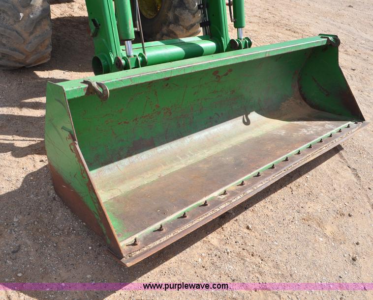 image for item F2024 2003 John Deere 7520 MFWD tractor