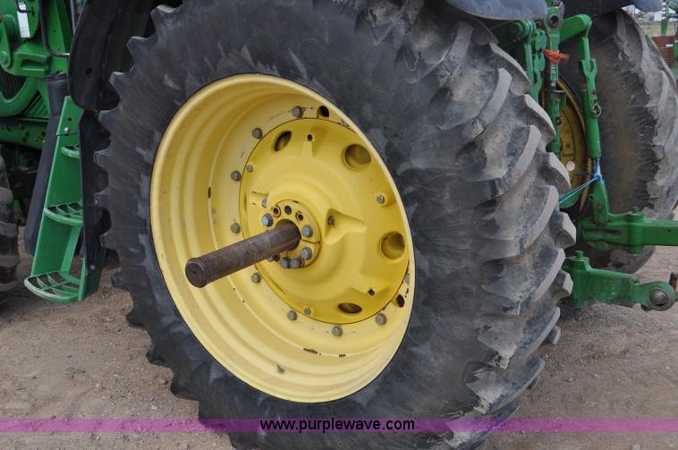 image for item F2024 2003 John Deere 7520 MFWD tractor