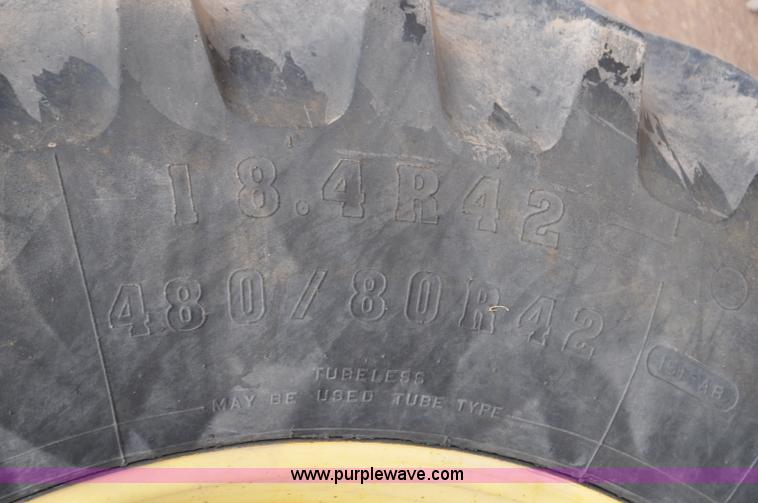 image for item F2024 2003 John Deere 7520 MFWD tractor