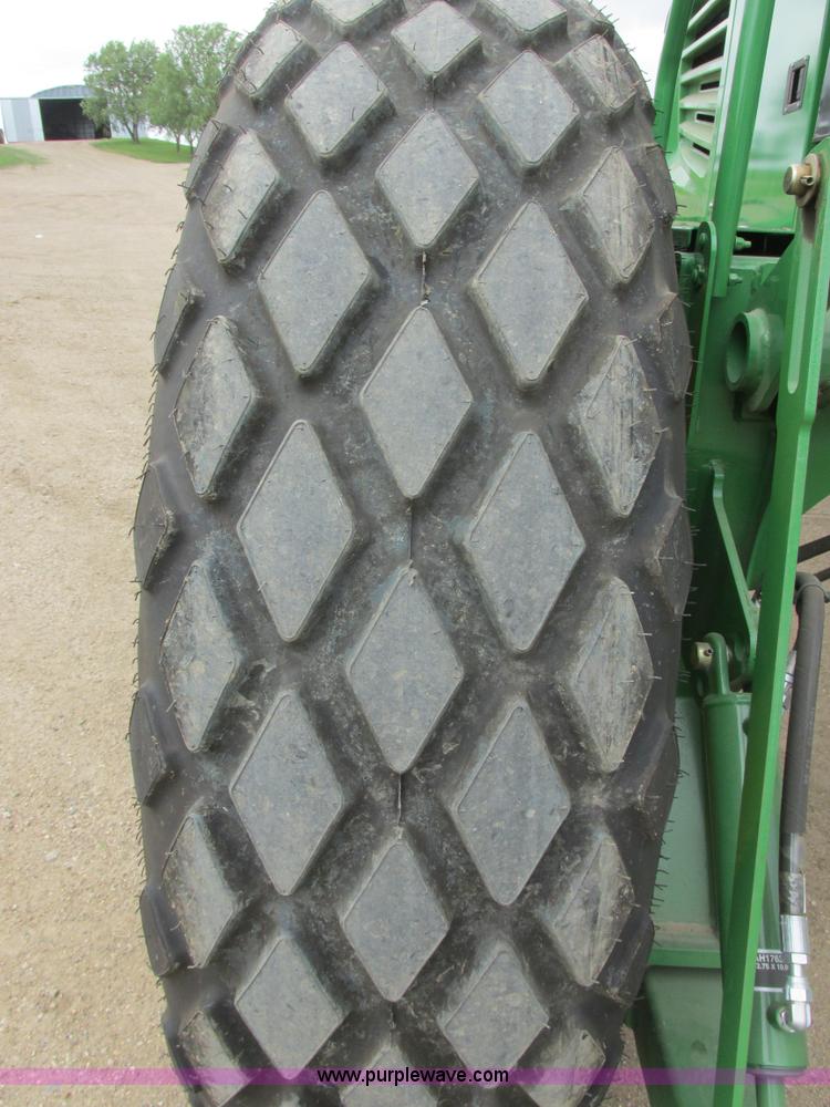 image for item I2543 2013 John Deere R450 SP self-propelled windrower