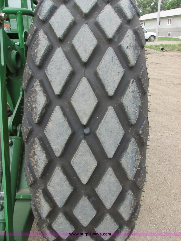 image for item I2543 2013 John Deere R450 SP self-propelled windrower