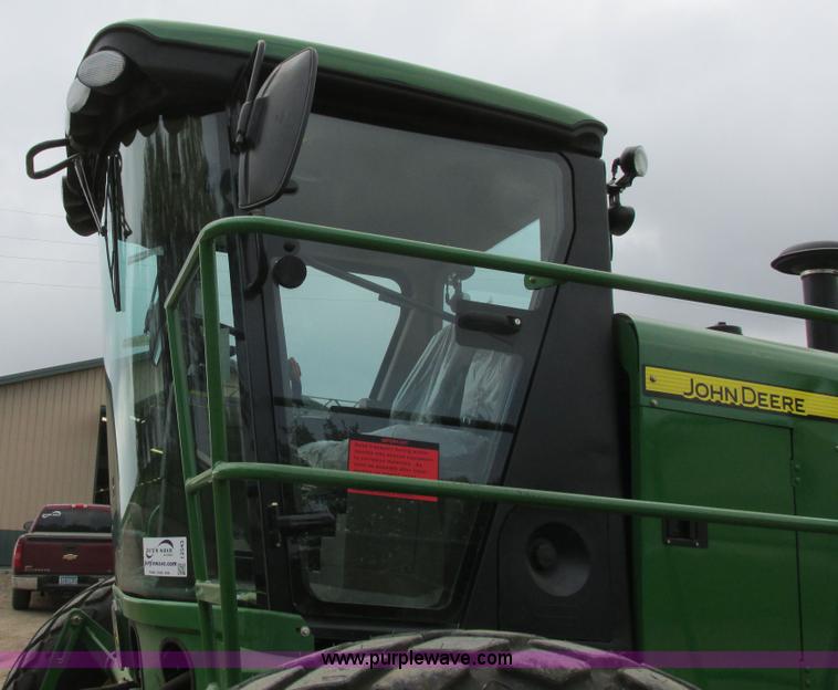 image for item I2543 2013 John Deere R450 SP self-propelled windrower