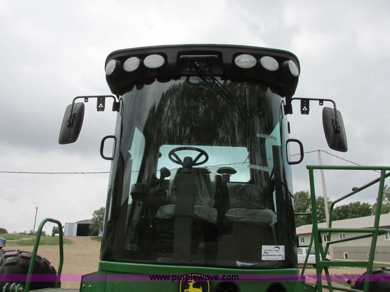 image for item I2543 2013 John Deere R450 SP self-propelled windrower