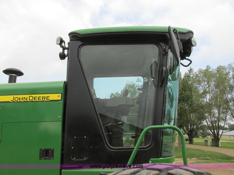 image for item I2543 2013 John Deere R450 SP self-propelled windrower