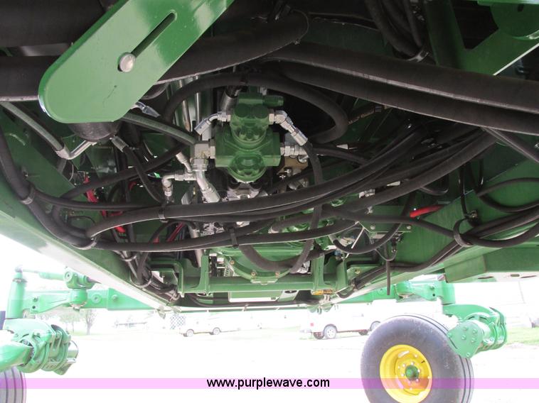 image for item I2543 2013 John Deere R450 SP self-propelled windrower