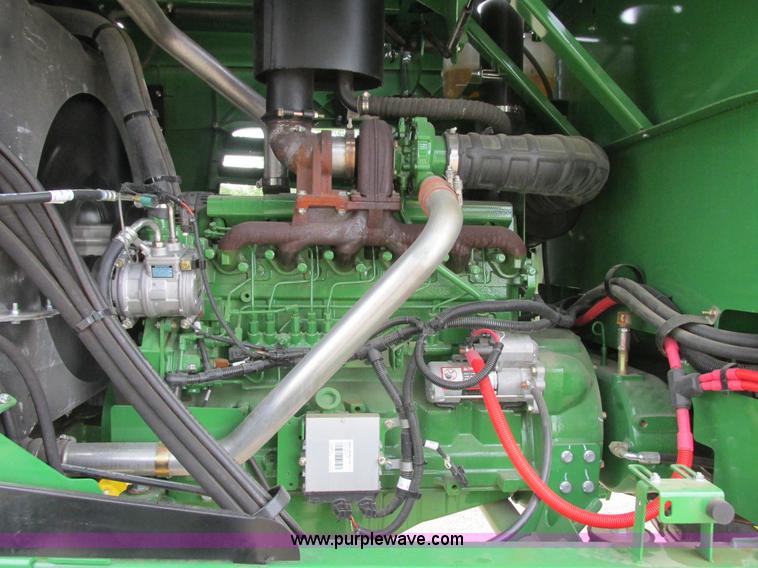 image for item I2543 2013 John Deere R450 SP self-propelled windrower