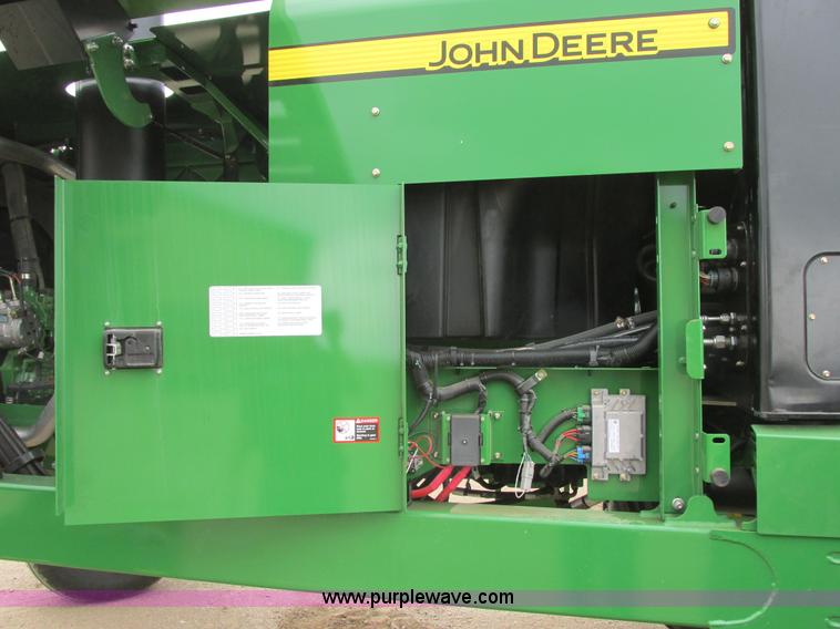 image for item I2543 2013 John Deere R450 SP self-propelled windrower