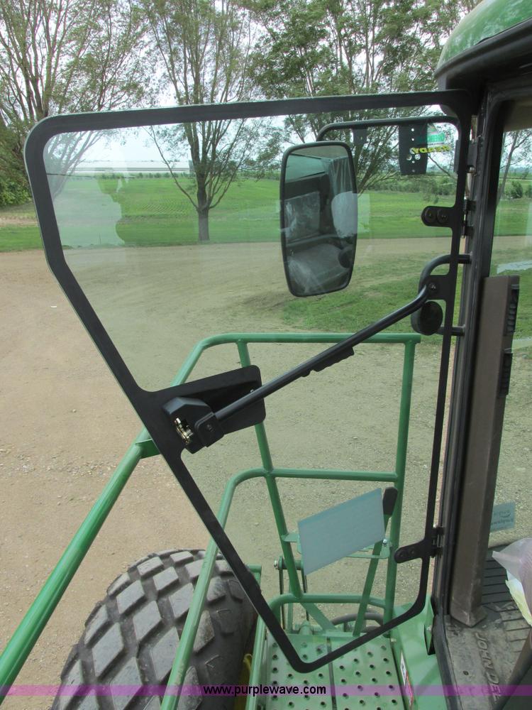 image for item I2543 2013 John Deere R450 SP self-propelled windrower