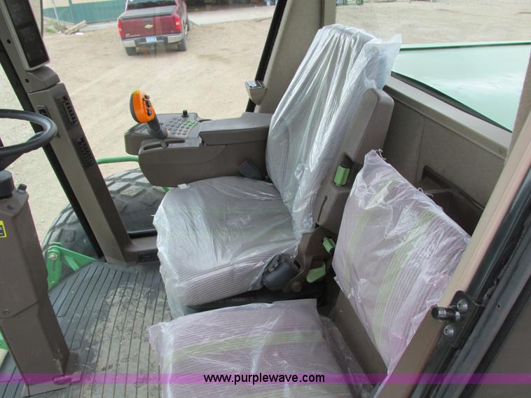 image for item I2543 2013 John Deere R450 SP self-propelled windrower