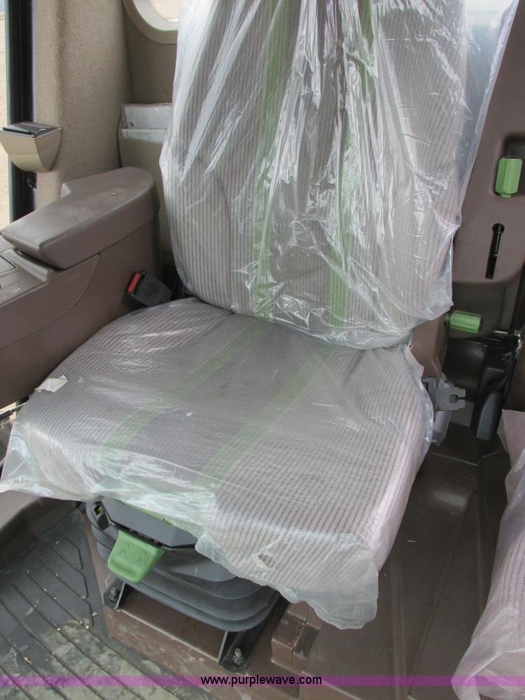 image for item I2543 2013 John Deere R450 SP self-propelled windrower