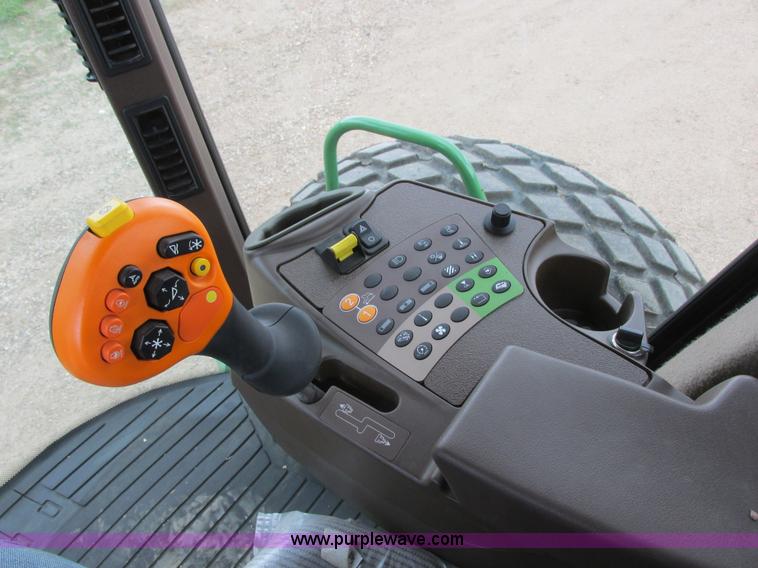 image for item I2543 2013 John Deere R450 SP self-propelled windrower