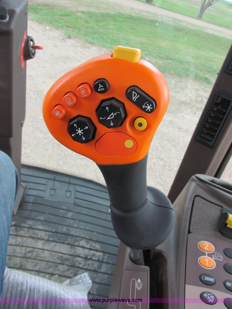 image for item I2543 2013 John Deere R450 SP self-propelled windrower