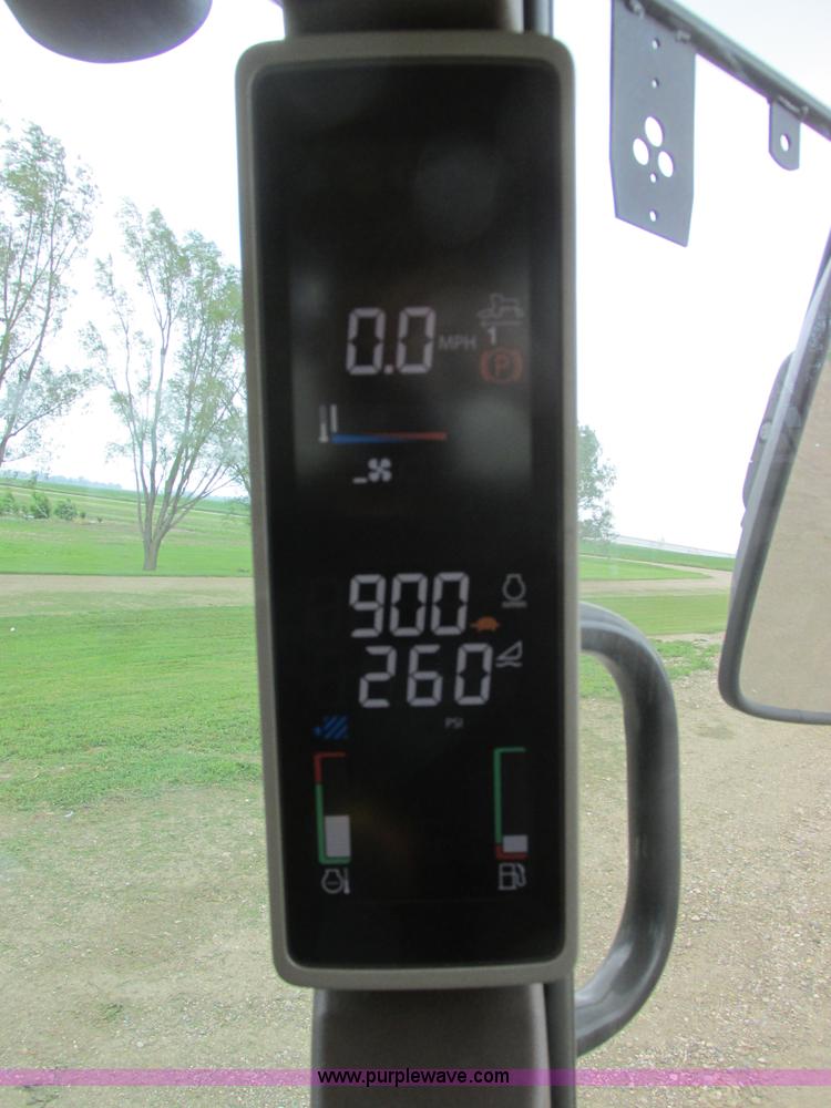 image for item I2543 2013 John Deere R450 SP self-propelled windrower