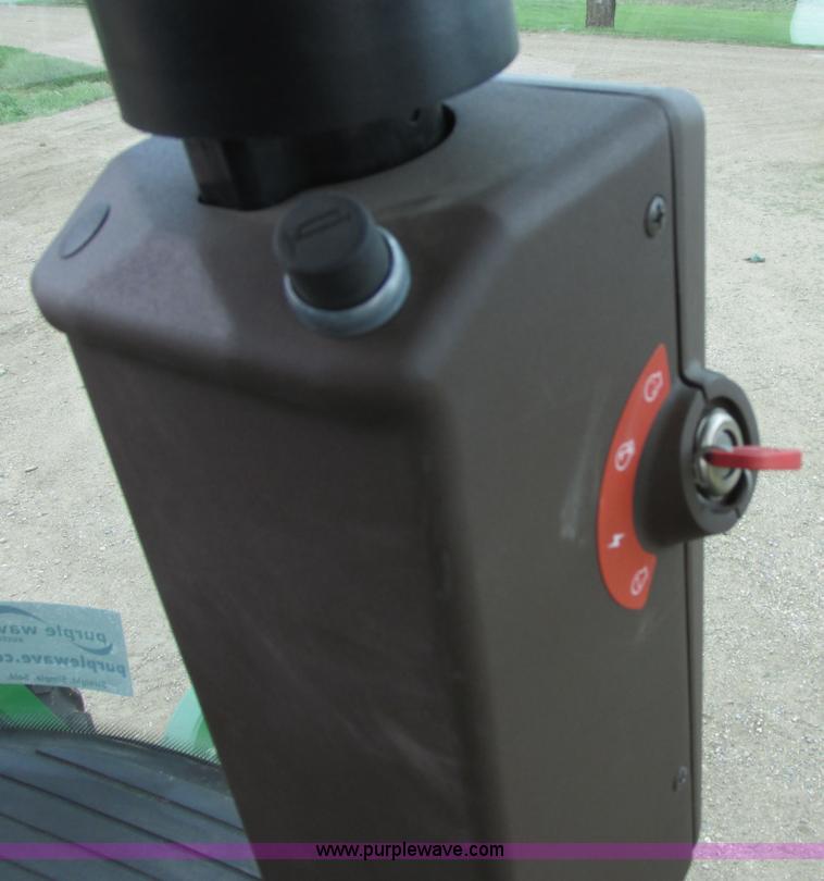 image for item I2543 2013 John Deere R450 SP self-propelled windrower