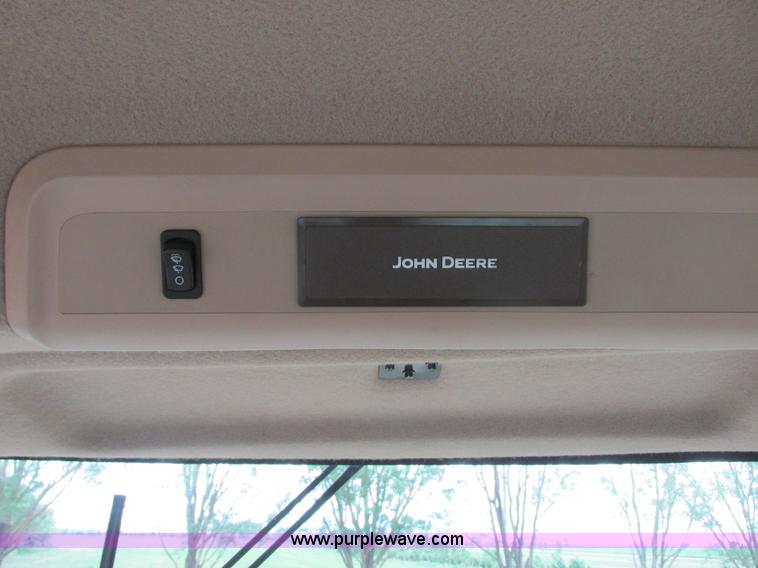 image for item I2543 2013 John Deere R450 SP self-propelled windrower